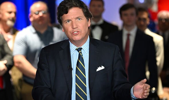 Tucker suggests is being prosecuted for calling out Washington DC insiders over Iraq