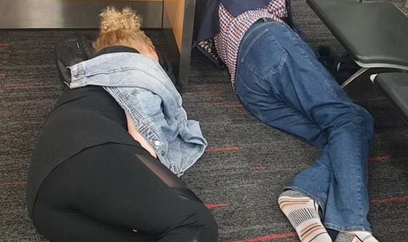 Passengers sleep on airport floor amid travel chaos
