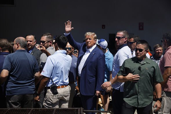 Donald Trump visits the Iowa Pork Producers Tent at the Iowa State Fair on August 12, 2023