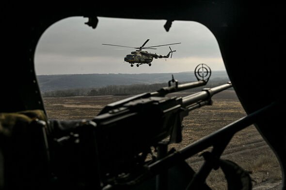 Ukrainian Mil Mi-8 helicopters fly in eastern Ukraine on March 10, 2023