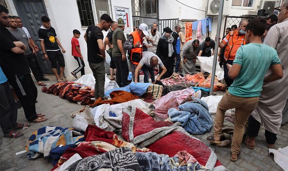Victims of Israel's strikes laid on a Gazan hospital floor